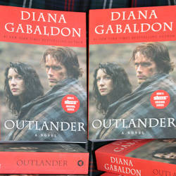 A Stack of Outlander Books by Diana Gabaldon